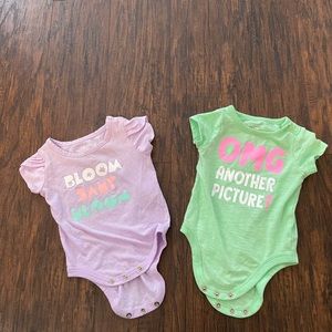 Two onesies , green and purple